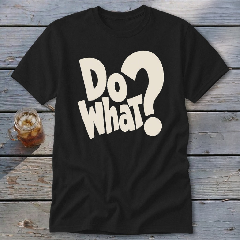 A black t-shirt featuring the white text "Do what?" on a wooden background.
