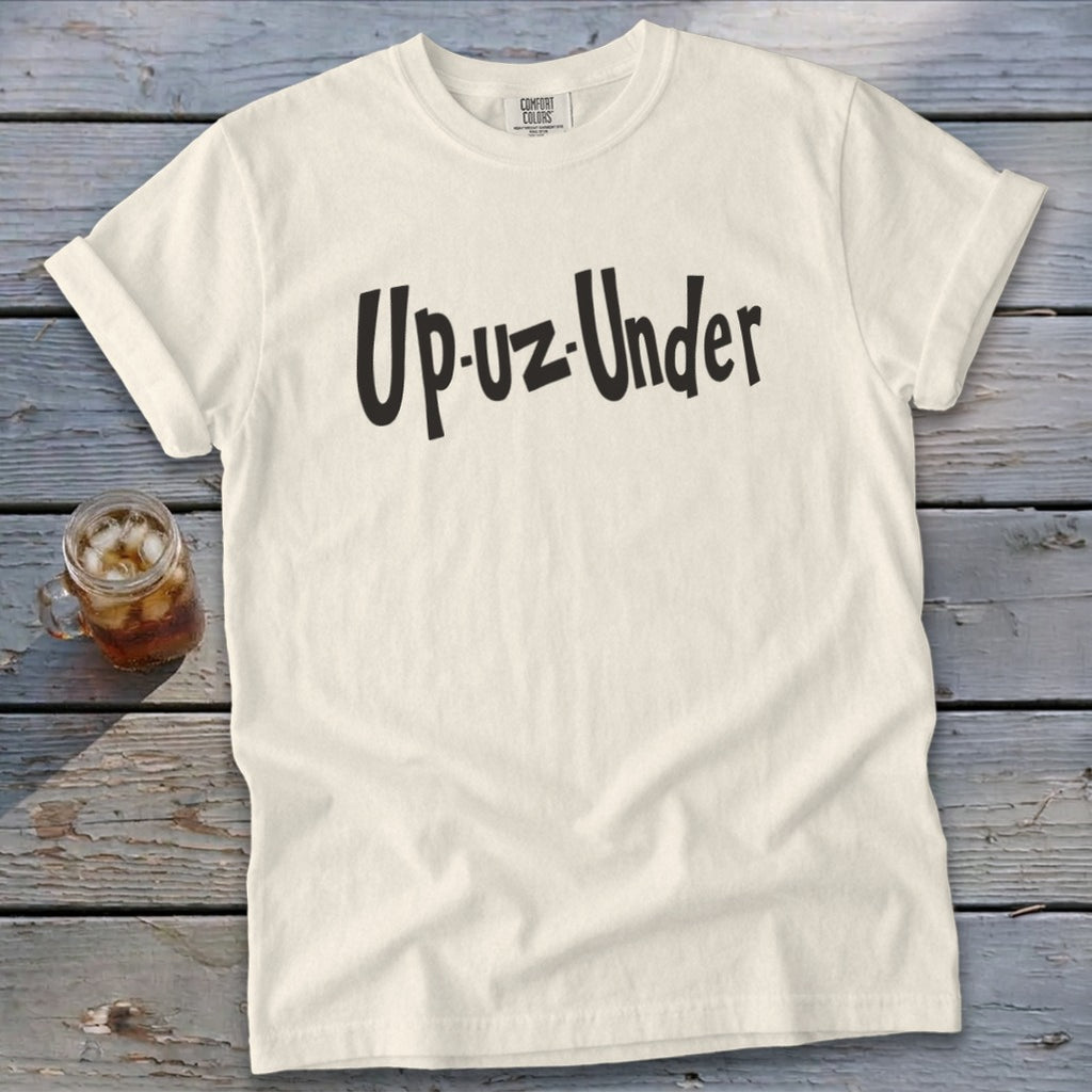 Cream t-shirt with "Up-uz-Under" graphic and Comfort Colors tag.