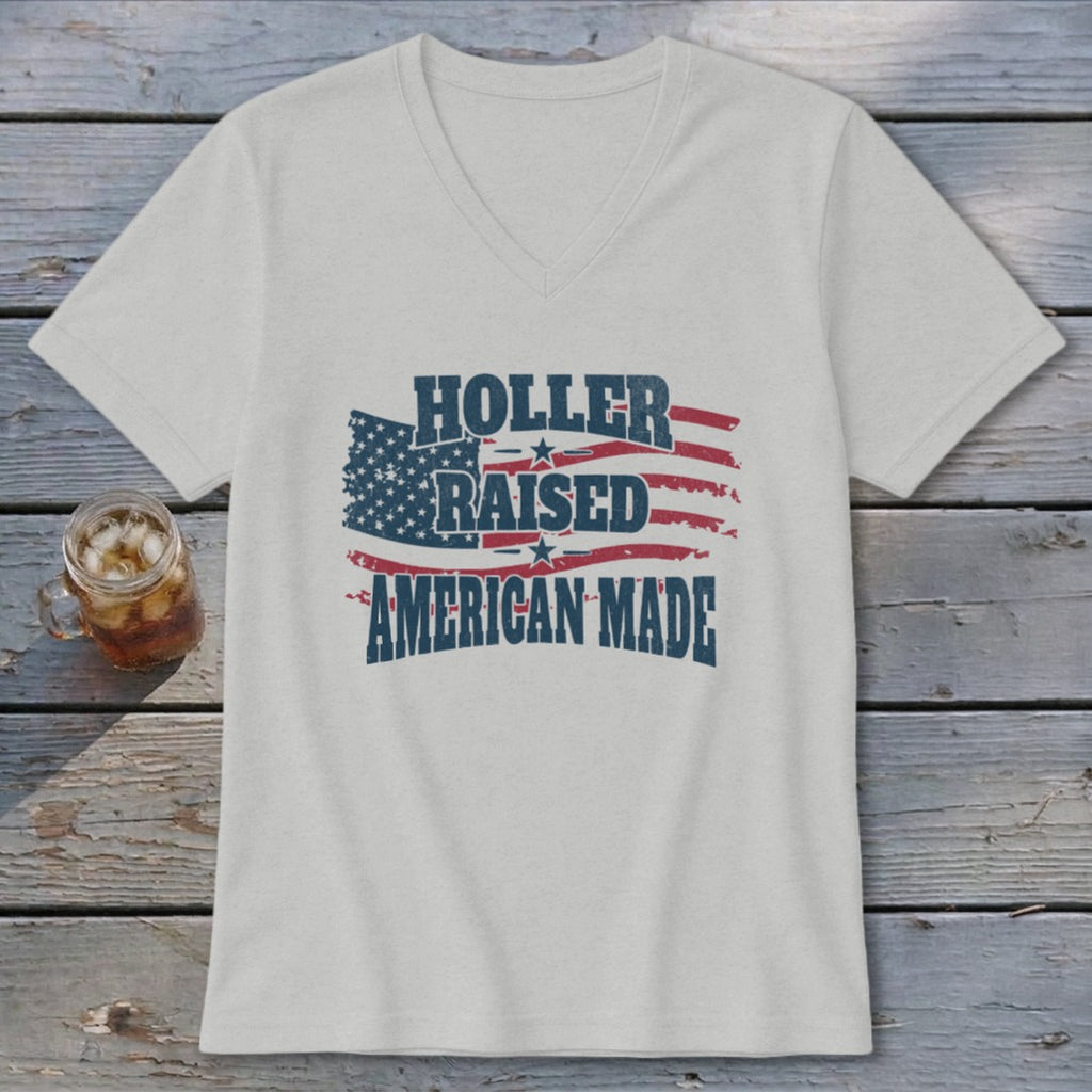 Light gray v-neck t-shirt with distressed American flag graphic and text.