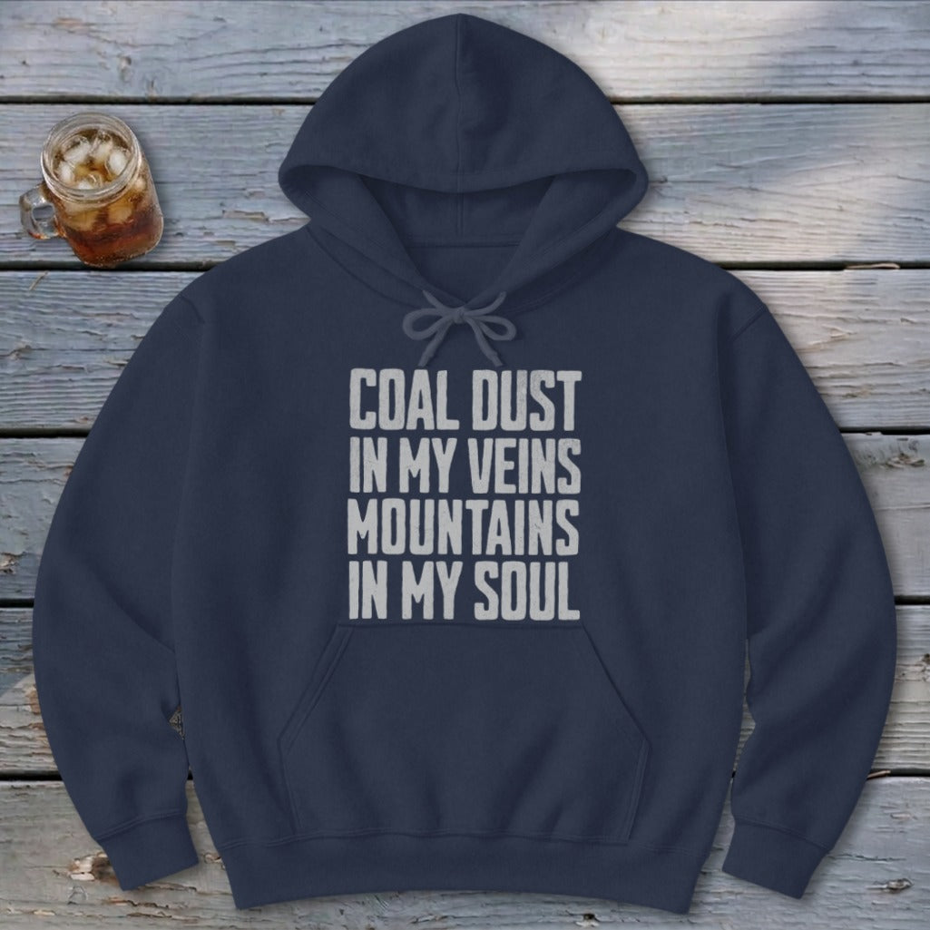 Navy blue hooded sweatshirt with white text reading COAL DUST IN MY VEINS MOUNTAINS IN MY SOUL.