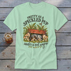 T-shirt with Speckled Pup sleeping under a red wagon graphic.