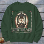 Green sweatshirt with a vintage lantern graphic and text "BUILT TO LAST".