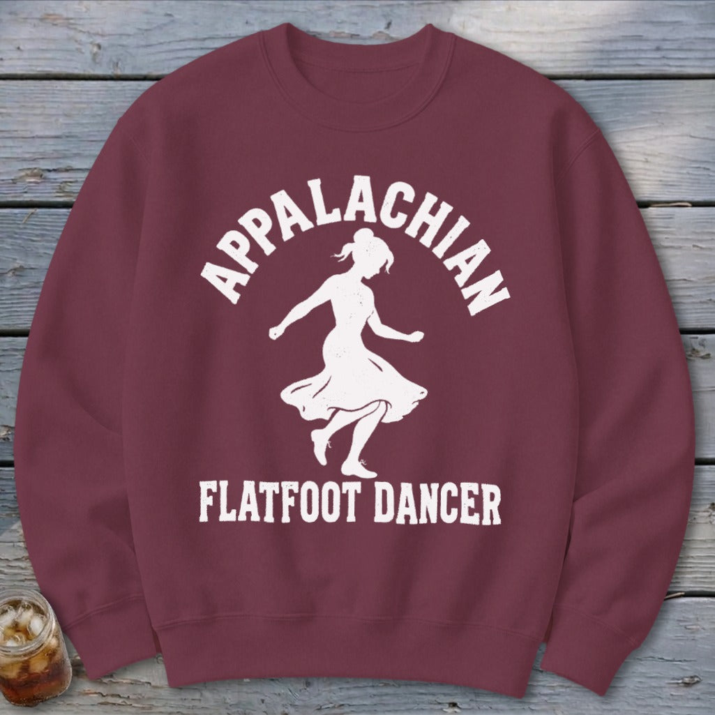 Maroon crewneck sweatshirt featuring a white graphic of a dancer with Appalachian Flatfoot Dancer text.
