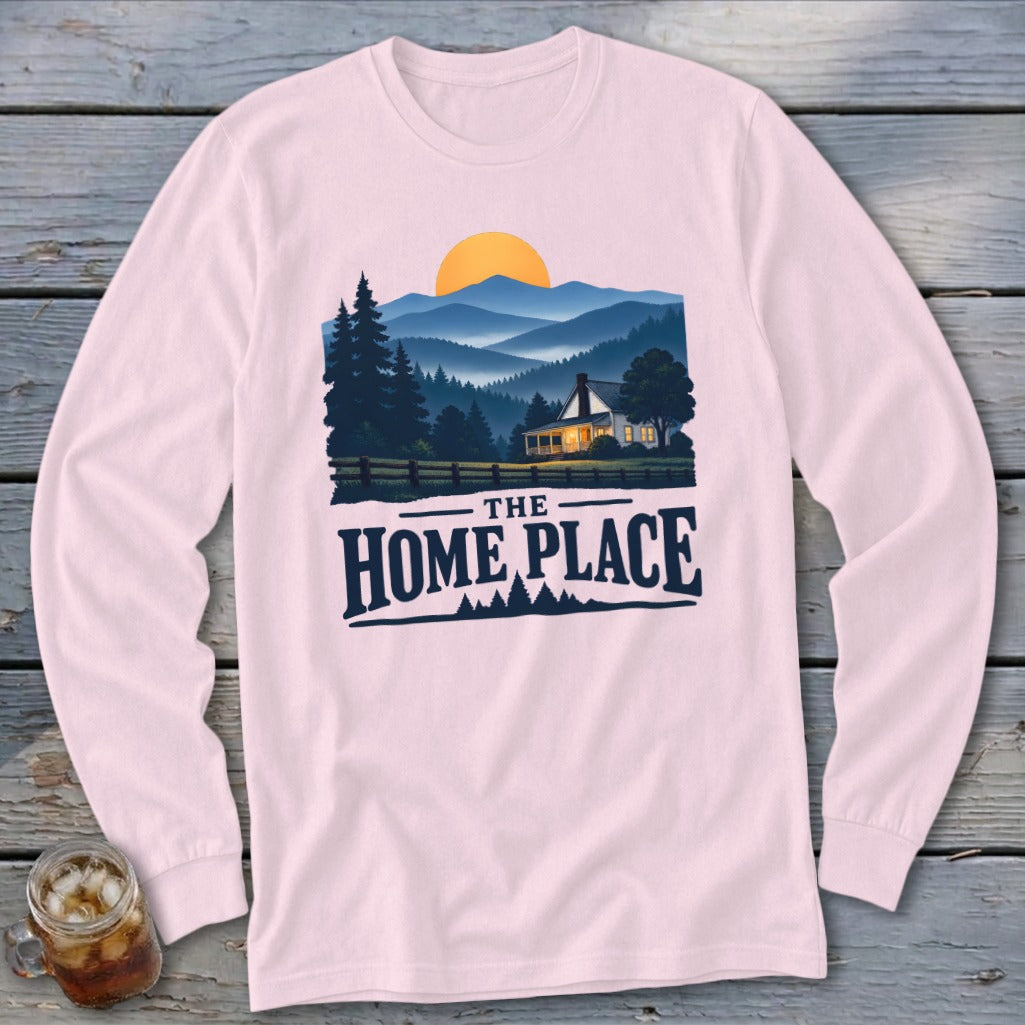 Pink long-sleeve shirt with "The Home Place" text and mountain landscape graphic.