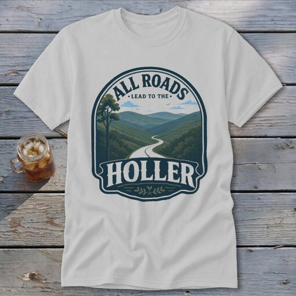 White t-shirt with "All Roads Lead to the Holler" graphic featuring a winding road through mountains.