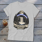 White t-shirt with a waterfall, moon, moonbow, and trees graphic with text "Moonbow Night".