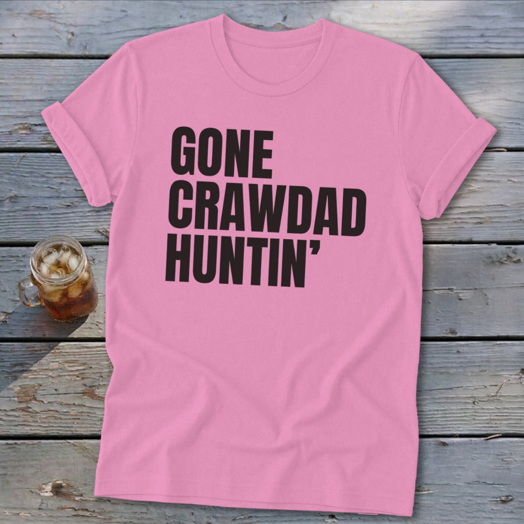 Pink t-shirt with black text that reads "GONE CRAWDAD HUNTIN'".