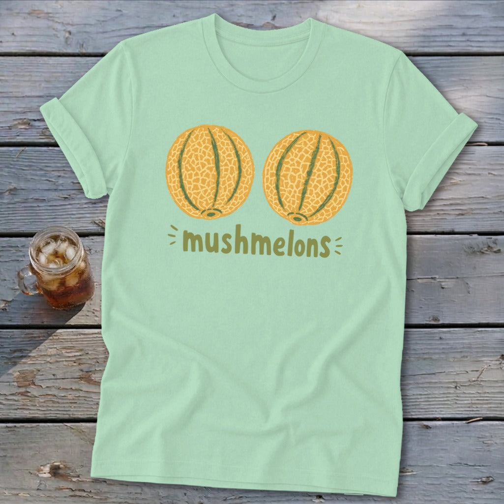 Light green t-shirt with two illustrated cantaloupes and "mushmelons" text.