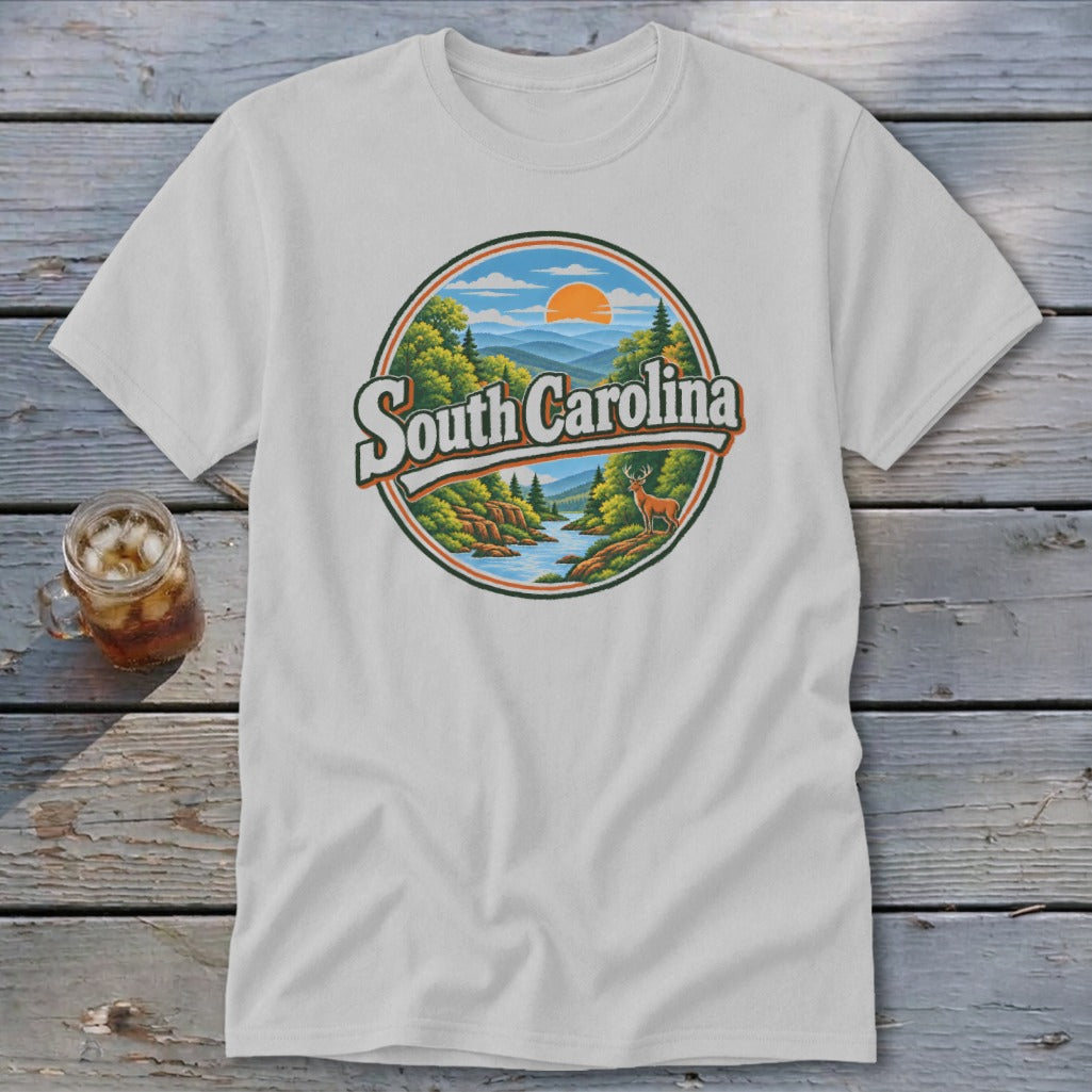 White t-shirt with "South Carolina" text and a circular scenic mountain, river, and deer graphic.