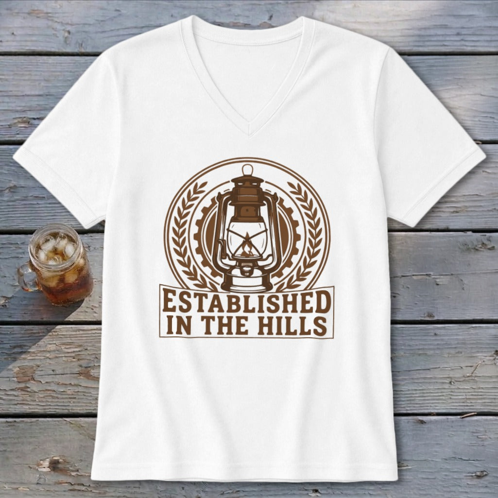 White t-shirt with brown lantern graphic and "ESTABLISHED IN THE HILLS" text.