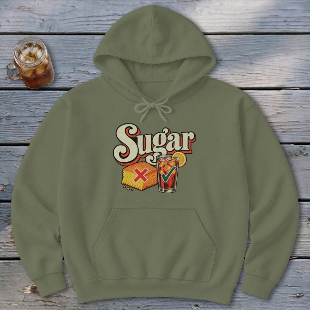 An olive green hooded sweatshirt featuring a retro graphic of cornbread with a red X and iced tea with a green checkmark below the text Sugar.