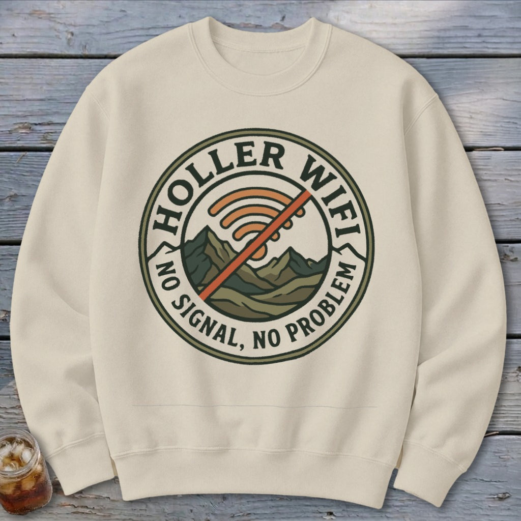 Cream sweatshirt with circular "Holler Wifi" graphic, featuring mountains and no signal icon.