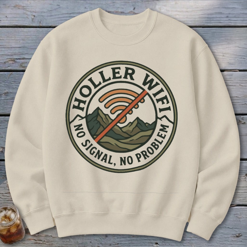 Cream sweatshirt with circular "Holler Wifi" graphic, featuring mountains and no signal icon.