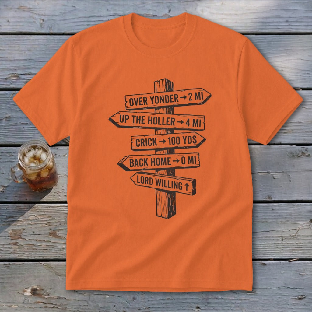 Orange t-shirt featuring a black graphic of a wooden signpost with directional distances and humorous text.