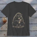 Dark grey t-shirt with a graphic of a bear carving wood.
