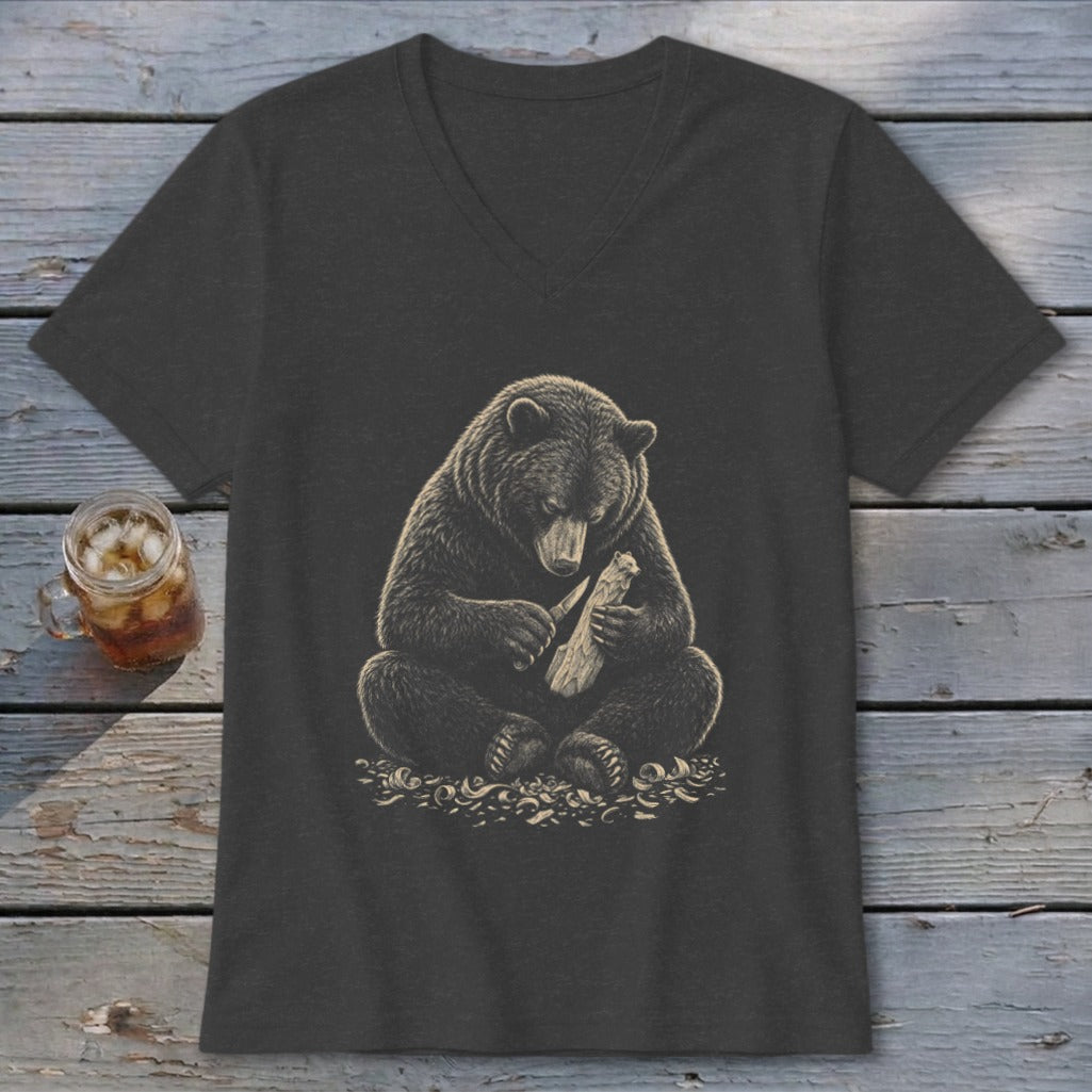 Dark grey t-shirt with a graphic of a bear carving wood.