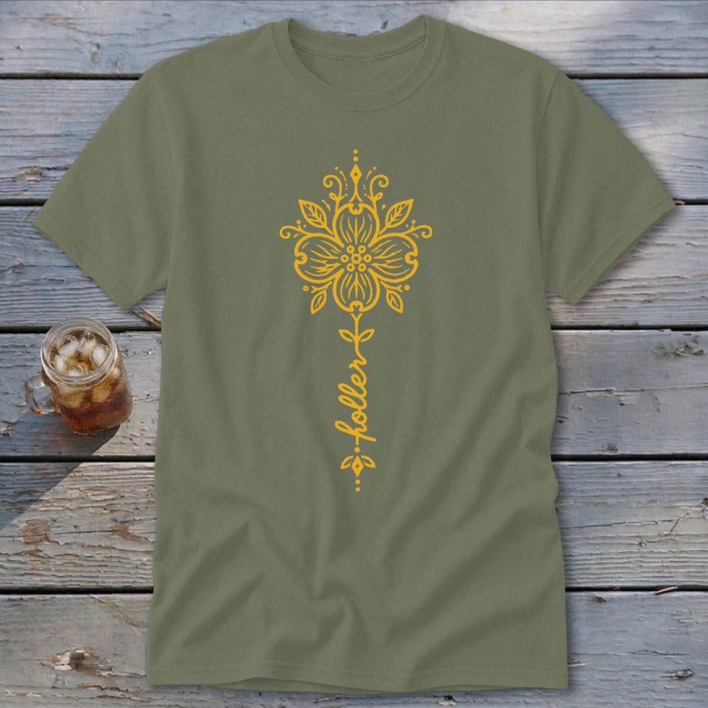 Olive green t-shirt with a vertical yellow floral design and the word "holler".