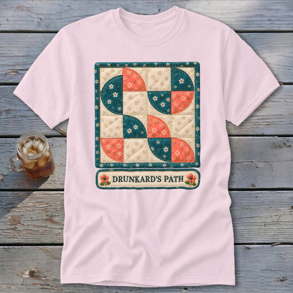 Pink t-shirt with a Drunkard's Path quilt design and text.