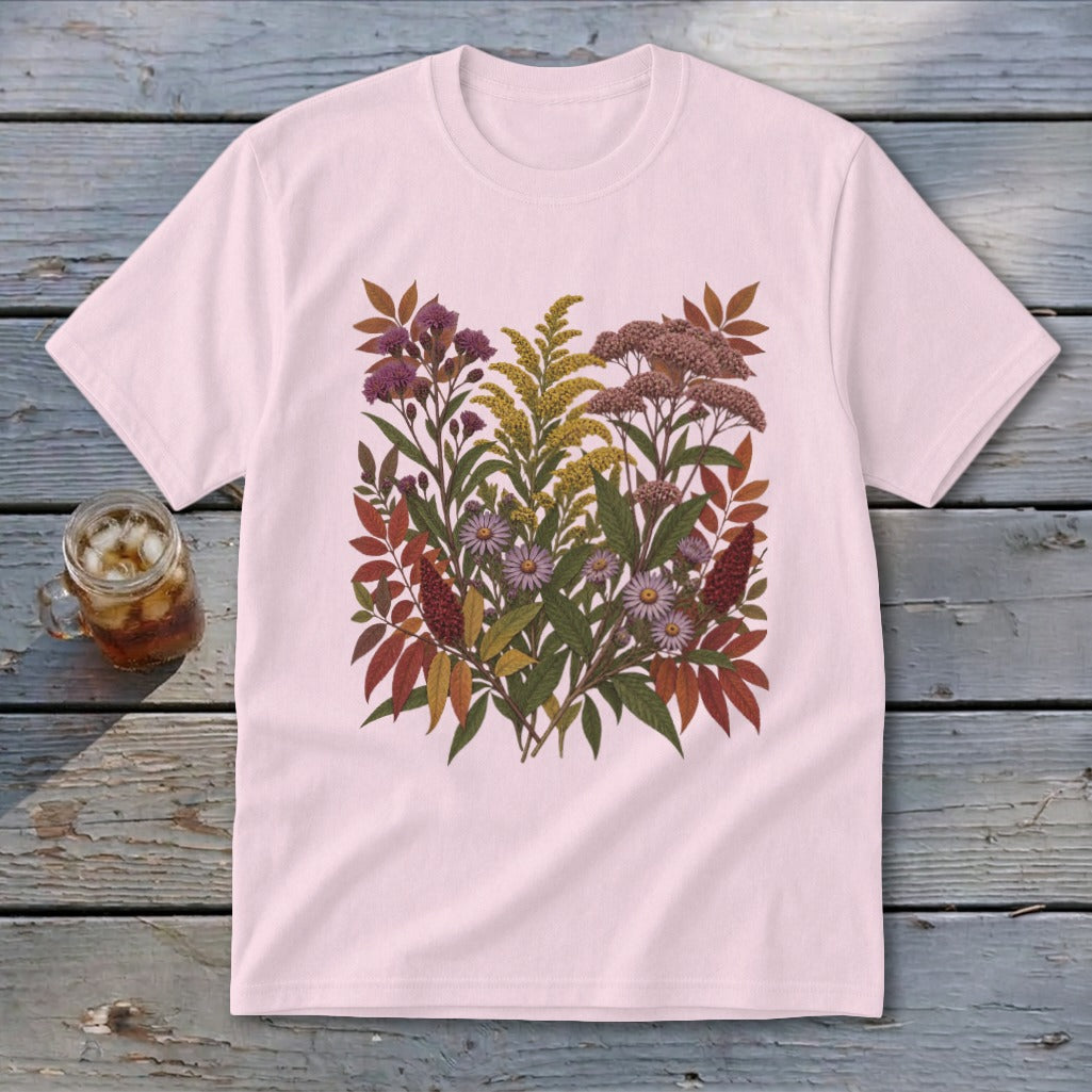 Pink t-shirt with a detailed floral and leaf print featuring purple, yellow, and pink blooms.
