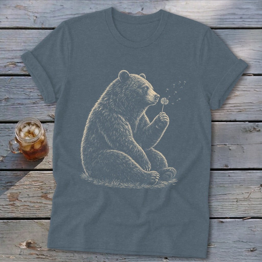 Bear blowing dandelion seeds on a t-shirt.