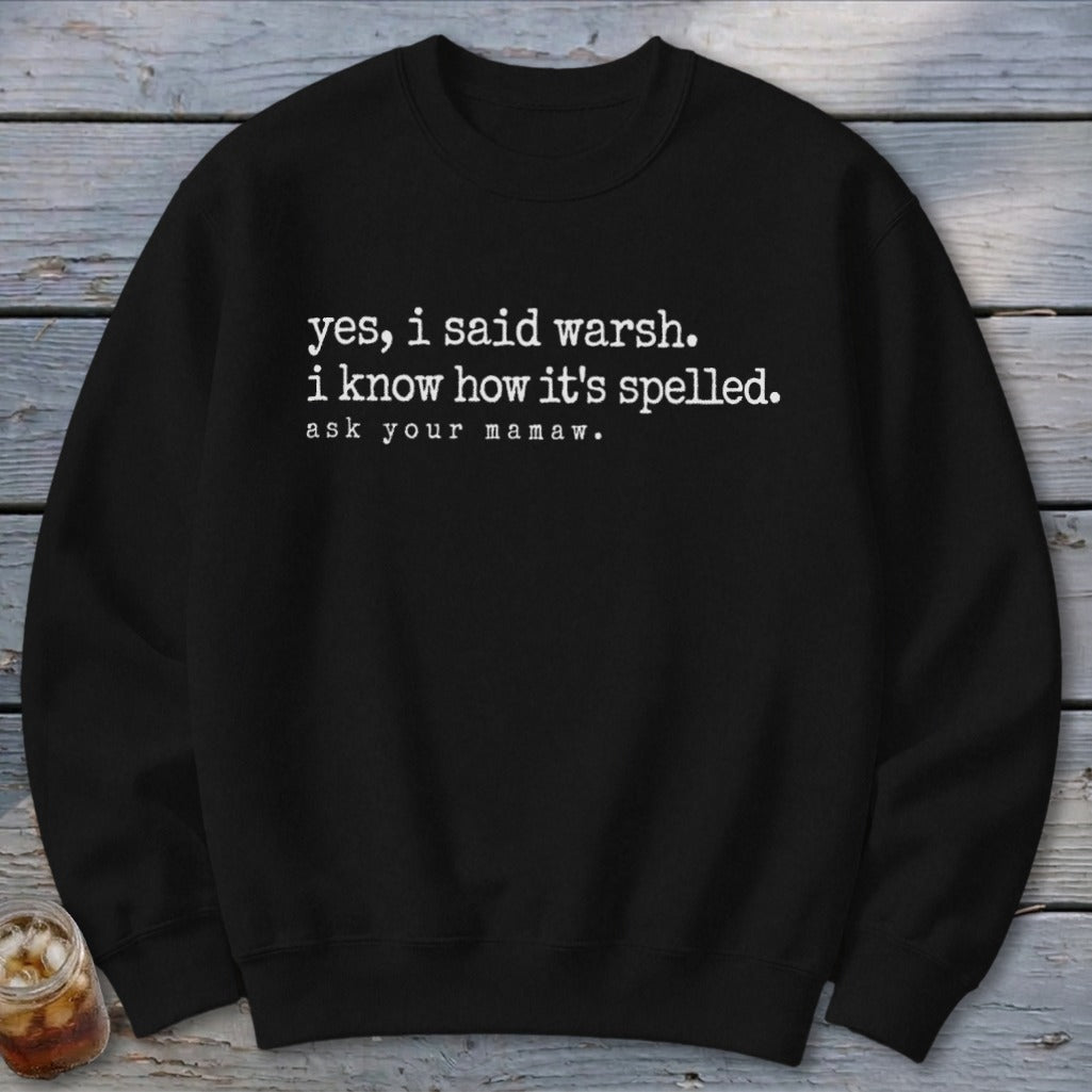 Black sweatshirt with white text: "yes, i said warsh. i know how it's spelled. ask your mamaw."