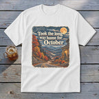 White t-shirt with vintage autumn landscape print and "Took the long way home for October" text.
