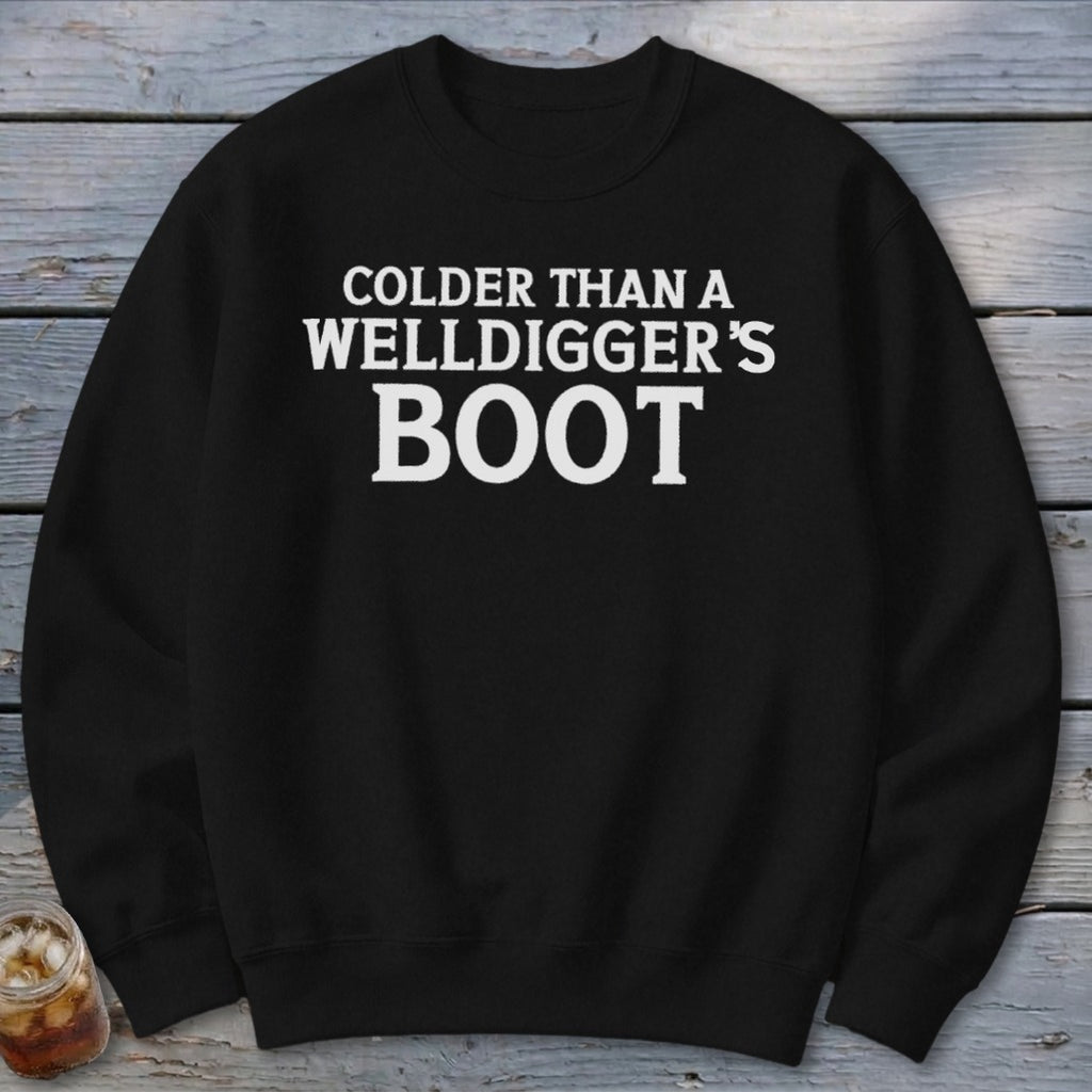 Black crewneck sweatshirt with white text reading "Colder than a welldigger's boot."