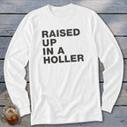 White long-sleeve shirt with "RAISED UP IN A HOLLER" text.