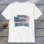 White t-shirt with "Virginia Raised American Made" text and distressed American flag graphic.