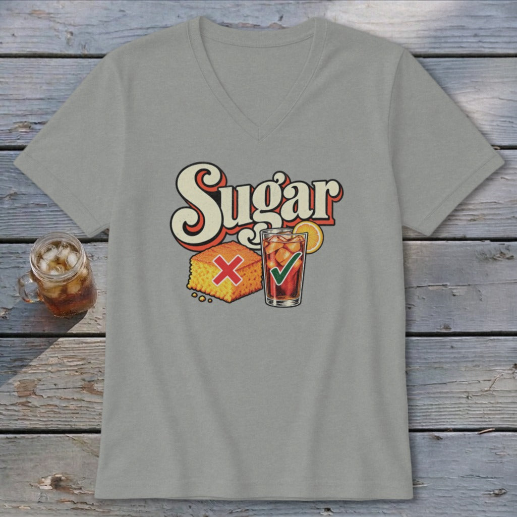 A gray V-neck t-shirt featuring graphic text that reads Sugar above illustrations of cornbread with a red X and iced tea with a green checkmark.