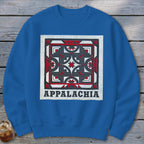 Blue crewneck sweatshirt featuring a geometric red, white, and black square design above the text APPALACHIA.