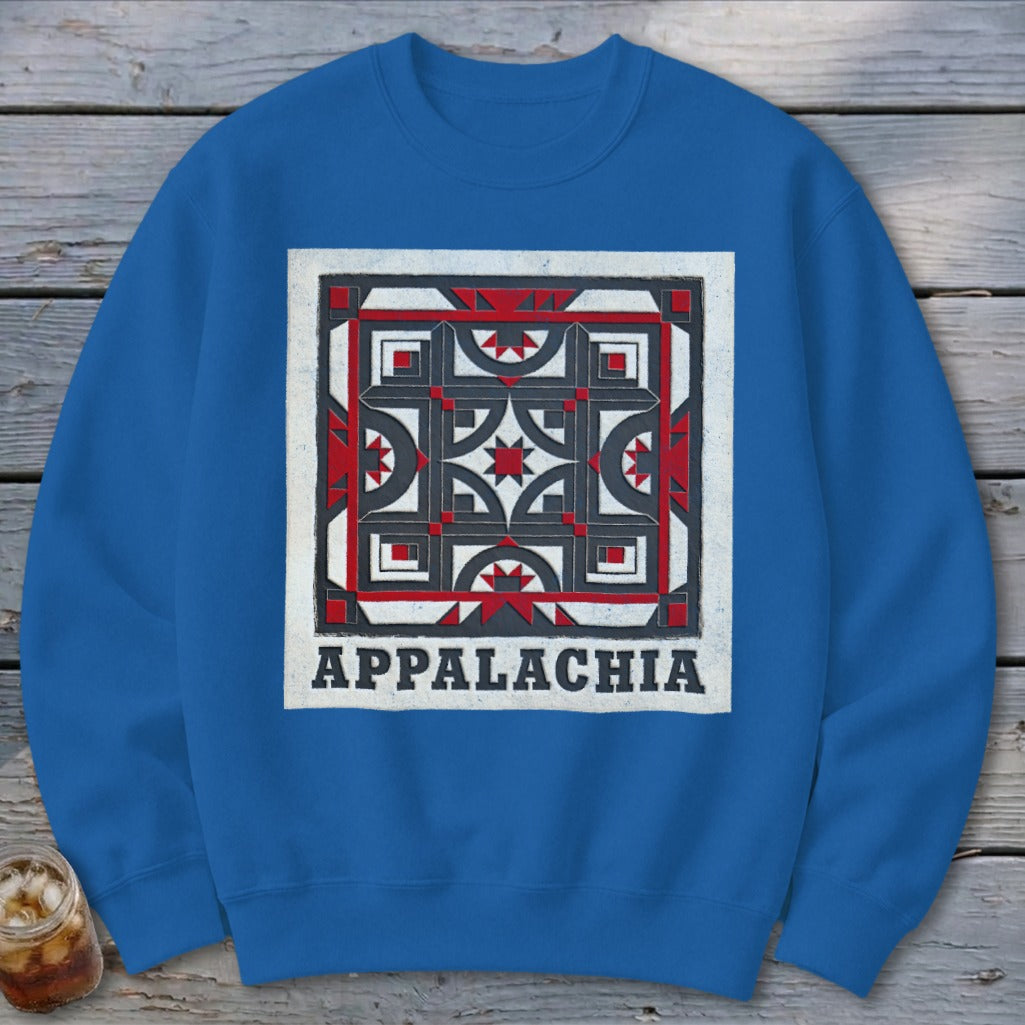 Blue crewneck sweatshirt featuring a geometric red, white, and black square design above the text APPALACHIA.