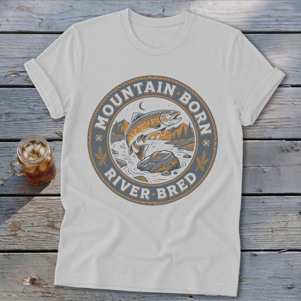 White t-shirt with "Mountain Born River Bred" circular graphic featuring a jumping fish.