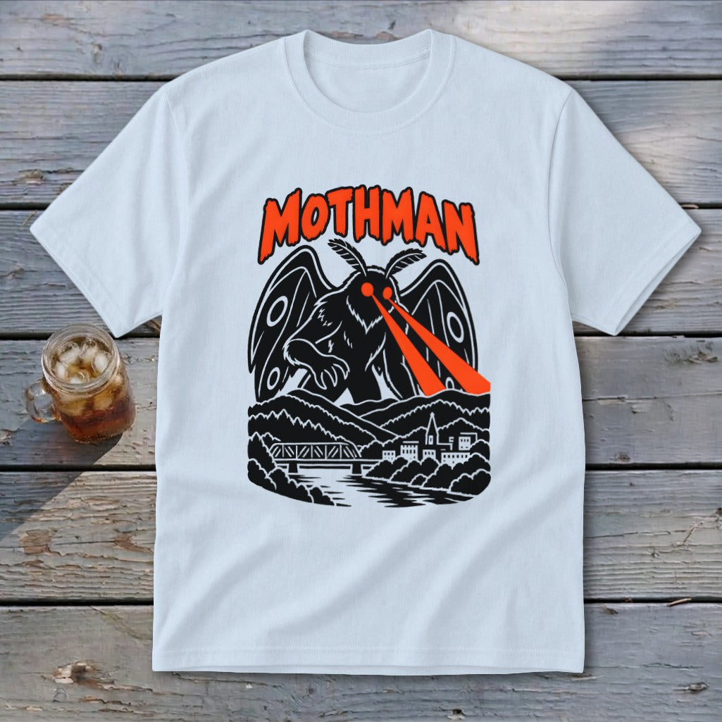 White t-shirt featuring a black Mothman graphic with orange eyes and text.