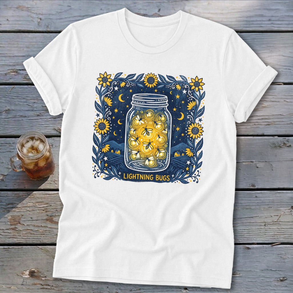 White t-shirt with a jar of lightning bugs design and the text "LIGHTNING BUGS".