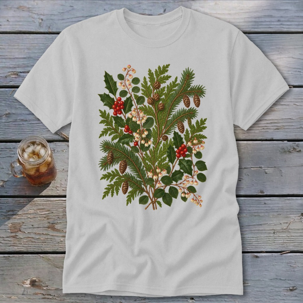 White t-shirt with a vintage botanical print of pine, holly, berries, and pinecones.