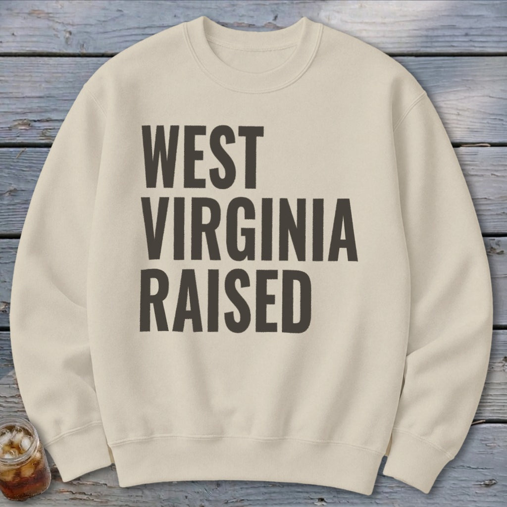 Cream sweatshirt with "West Virginia Raised" printed in dark gray text.