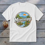 White t-shirt with circular design featuring "Mississippi" text and a woodland scene.
