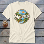 Cream t-shirt with circular graphic featuring "Maryland," mountains, river, and deer.
