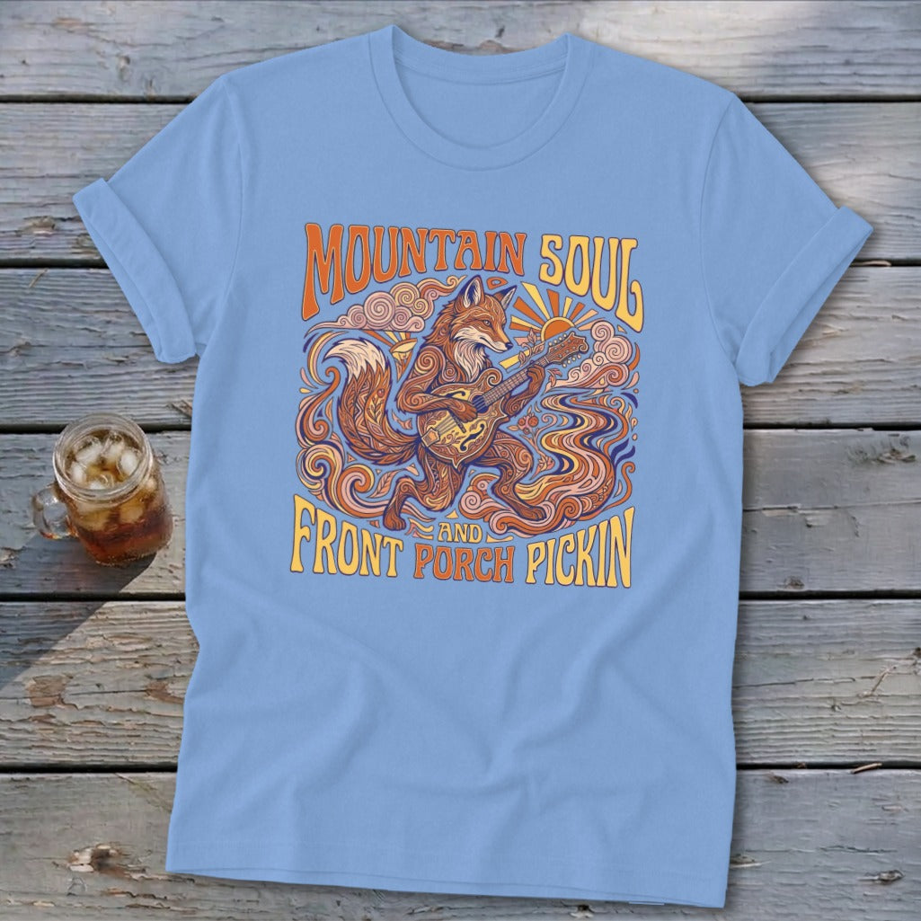 Light blue t-shirt with a fox playing a mandolin and text "Mountain Soul and Front Porch Pickin".