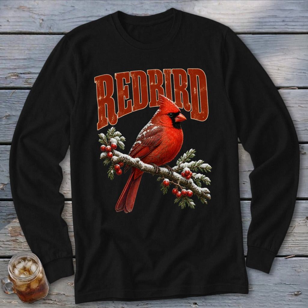 Black long-sleeve t-shirt featuring a red cardinal on a snowy branch with the text "REDBIRD".