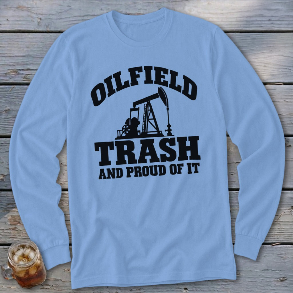 Light blue long-sleeved shirt with "OILFIELD TRASH AND PROUD OF IT" text and pumpjack graphic.