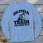 Light blue long-sleeved shirt with "OILFIELD TRASH AND PROUD OF IT" text and pumpjack graphic.