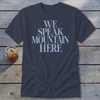 Navy t-shirt with light blue text reading "WE SPEAK MOUNTAIN HERE".