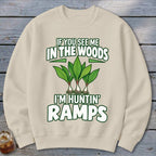 Beige crewneck sweatshirt featuring green text that reads IF YOU SEE ME IN THE WOODS I'M HUNTIN' RAMPS above three green ramp plants.