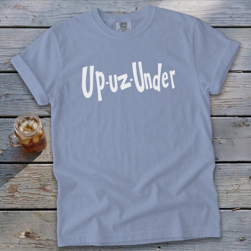 Light blue t-shirt with white "Up-uz-Under" text and a glass of iced tea.