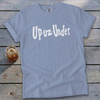 Light blue t-shirt with white "Up-uz-Under" text and a glass of iced tea.