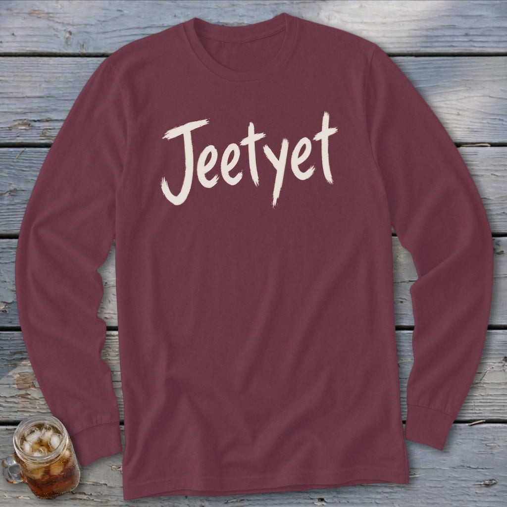 Maroon long-sleeved shirt with "Jeetyet" text in cream paint brush font.