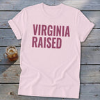 Light pink t-shirt with "Virginia Raised" in burgundy lettering.