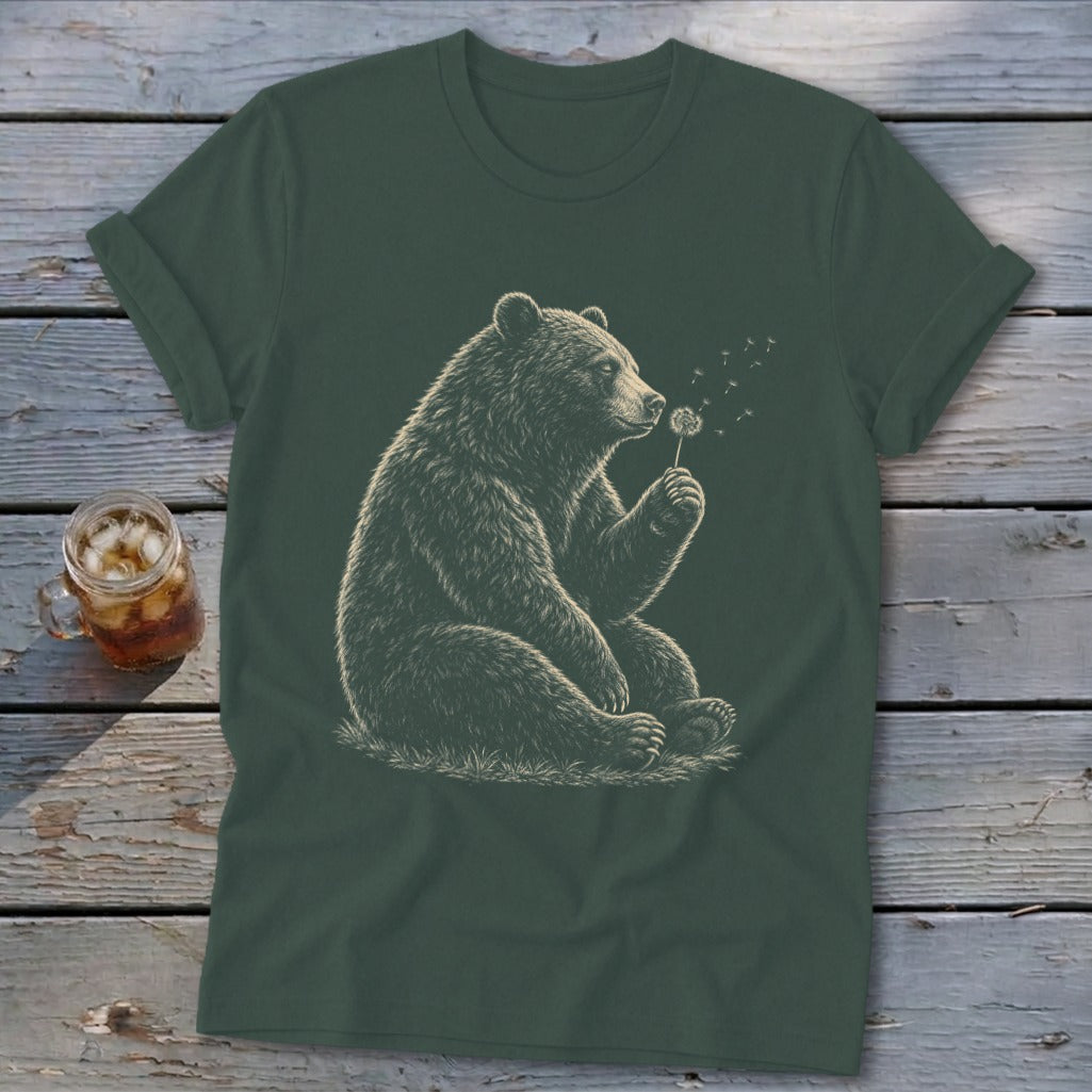 Bear blowing on a dandelion on a dark green t-shirt.